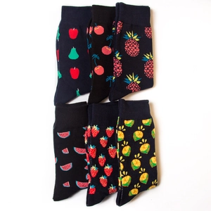 6 pairs of cotton crew socks featuring various fruit patterns on dark blue and black base