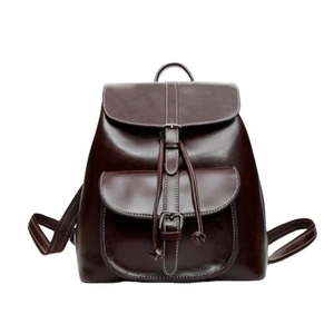Dark brown oil wax cowhide leather backpack featuring drawstring flap and front pockets