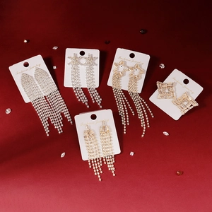 Sparkling long tassel earrings and star zircon studs set in gold and silver finish