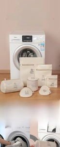 Detailed set of mesh laundry bags with zipper protection for delicate clothes care