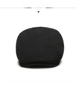 Front view of a classic black cotton newsboy cap featuring detailed twill stitching