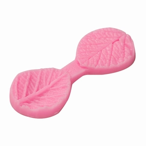 Pink silicone leaf vein impression mold for DIY fondant and chocolate cake decorating