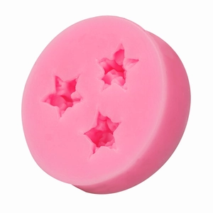 Pink silicone mold featuring three star cavities for DIY baking and chocolate making