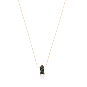 Detail of rose gold mermaid tail pendant with green resin stone inlay and delicate chain