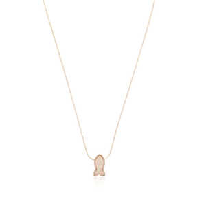 Detail view of rose gold mermaid necklace with white opal stone on white backdrop