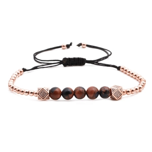 Rose gold bead bracelet with brown stones, zircon cubes and adjustable black cord