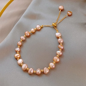 Vintage irregular freshwater pearl bracelet with gold beads and adjustable sliding clasp