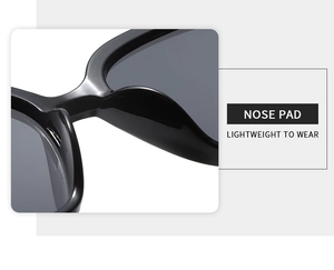 Detailed macro view of the integrated nose pad on black retro square frame sunglasses