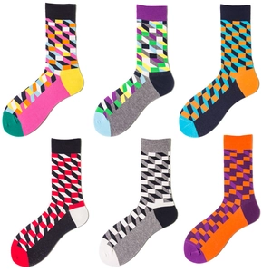 Detail view of six pairs of colorful geometric cube pattern cotton crew socks for men