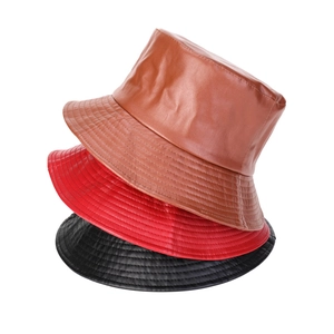 Classic PU leather bucket hats in black, red, and brown for men and women