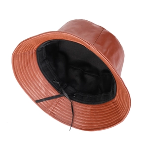 Brown PU leather bucket hat with black breathable lining and adjustable drawcord