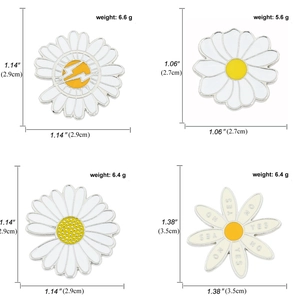 Daisy enamel pins set with size and weight specs on a clean white background