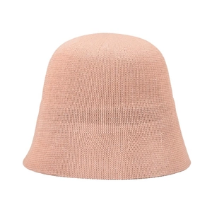 Detail of light pink knitted bucket hat showing fine elastic knit texture and round shape