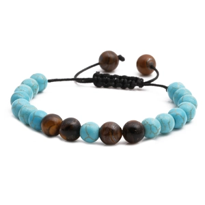 Adjustable woven bracelet with turquoise and tiger eye beads on a white background