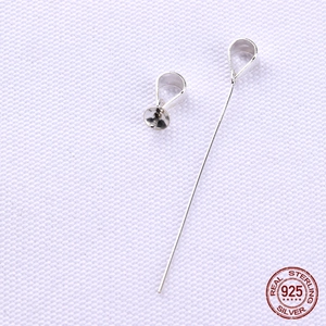 Detailed macro view of S925 sterling silver pendant pinch bails and pins for DIY jewelry