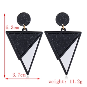 Detailed view of geometric acrylic earrings with dimensions 6.3cm height and 3.7cm width