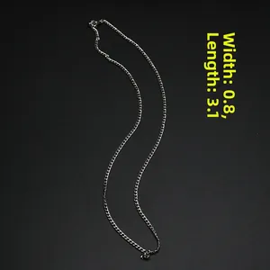 Detail shot of 0.8mm width silver stainless steel curb chain on a black background