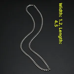 Detail of silver stainless steel curb chain width 1.2cm size 4.5 on black background