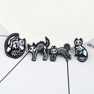 Punk style skeleton cat enamel pin set in black and white finish for creative accessory