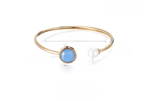 Détails du bracelet en acier doré avec cristal bleu, perle blanche et dimensions