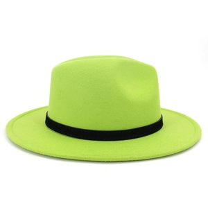 Detail of a neon green wool fedora hat featuring a classic black decorative ribbon band