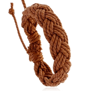 Handmade brown braided hemp rope bracelet with adjustable knot in a minimalist style