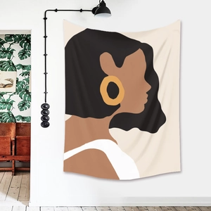 Detail view of Bohemian wall tapestry with abstract modern female silhouette illustration