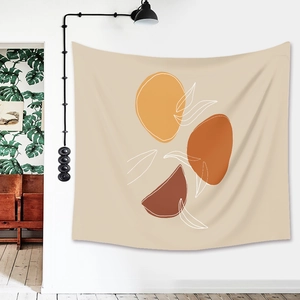 Detail of bohemian wall tapestry with abstract color blocks and white botanical line art