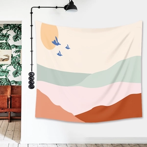 Modern bohemian tapestry with minimalist sun and mountain landscape for wall decor