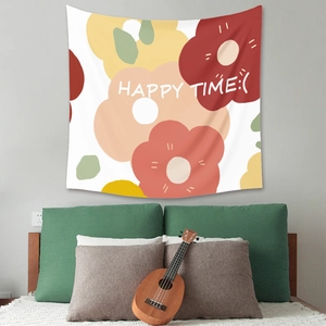Detail of bohemian tapestry featuring floral geometric patterns and Happy Time typography