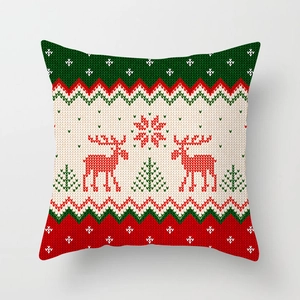 Detailed knit texture of Christmas pillowcase with reindeer and snowflake patterns