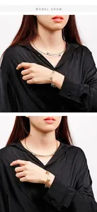 Minimalistisches Set aus Edelstahl-Halskette und Armband mit Kugel am Modell
