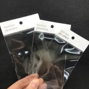 Thick transparent OPP jewelry bags with white fashion jewelry header cards and hanging holes