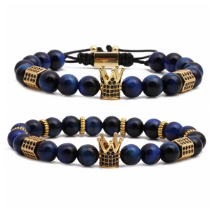 Blue tiger eye beaded bracelet set with golden crown charms and black zircon spacers