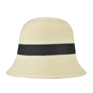 Straw bucket hat in beige with black ribbon detail shown on a clean white background