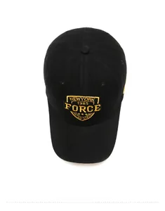 Top-down view of black cotton baseball cap with yellow New York 1985 embroidery detail