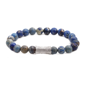 Bracciale di pietre imperiali blu con un distanziatore tubolare in argento e zirconi