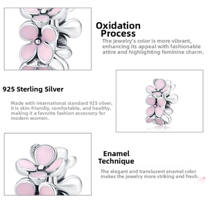 Detail of 925 sterling silver pink enamel flower charm bead with oxidized silver finish
