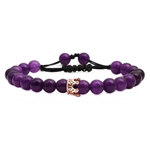 Tiger eye and amethyst crown braided bracelet with adjustable cord on white background