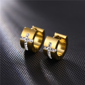 Golden stainless steel hoop earrings with sparkling cross pattern set in white zircons