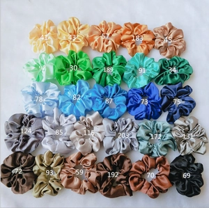 Detailed catalog showing 27 colors of glossy satin hair scrunchies with color ID numbers