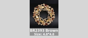 Macro detail of a 4.8cm round brown garland brooch with champagne rhinestones