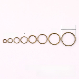 Detail view of various sizes 4mm-14mm bronze jump rings for DIY jewelry making