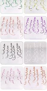 Detail of eight vibrant electroplated PVC spiral ceiling ornaments in various glossy colors