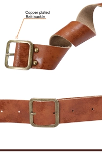 Detail of vintage brown leather belt with copper plated buckle for medieval Viking armor