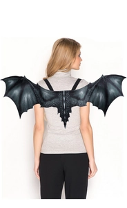 Detailed view of grey dragon wings featuring scale texture and elastic shoulder straps