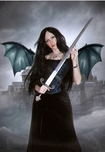 Detail of Gothic dragon wings and medieval metal sword accessory for Halloween cosplay costume