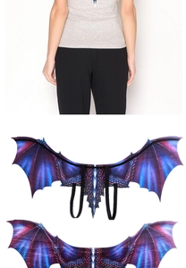 Detail of dragon wings with purple-blue gradient texture and black elastic straps