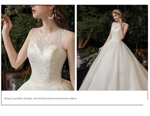 Close-up of white lace embroidery and sheer neckline on a slim fit wedding dress