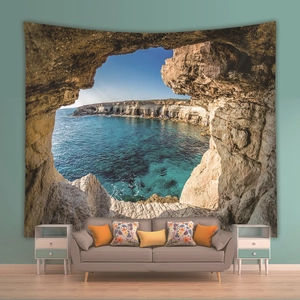 Detail of bohemian ocean cave tapestry used as a wall hanging decoration in a modern living room